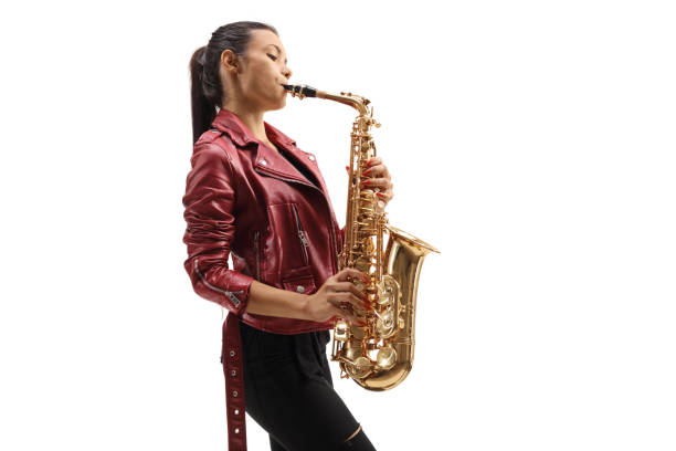 istock Female saxophonist performing 1264107258