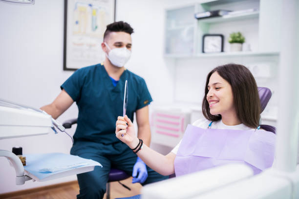 istock Dentist And Patient In a Dental Studio 1264114886
