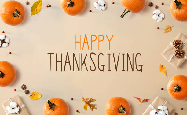 istock Thanksgiving message with autumn pumpkins with present boxes 1264116448