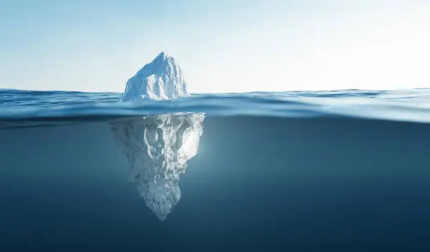 Photo of Tip of the iceberg. Half underwater.