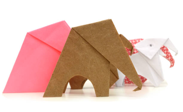 istock A 'family' origami elephant paper on white 1264116879