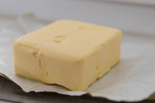 istock a piece of butter on paper 1264117697