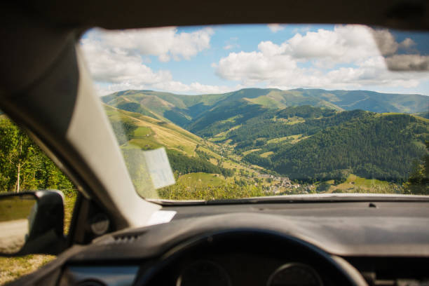 istock Beautiful mountain landscape as seen from inside a car 1264118225