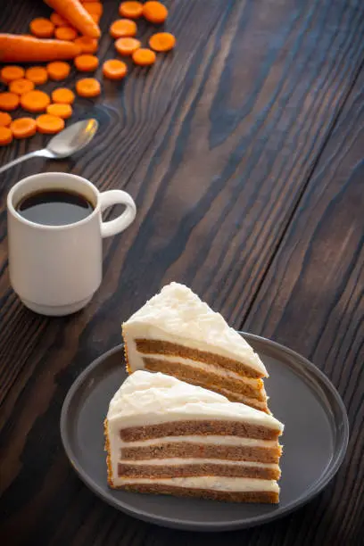 Carrot cake slices with carrot ingredients vegan breakfast with coffee cup
