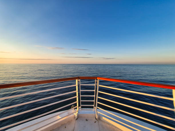 Bow of a cruise ship sailing the baltic sea at sunset