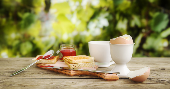 Digitally generated breakfast with jam, egg, toasted bread and a cup of coffee.\n\nThe scene was rendered with photorealistic shaders and lighting in Autodesk® 3ds Max 2020 with V-Ray 5 with some post-production added.