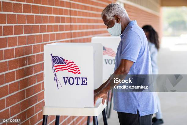 Senior Black Man Voting With A Mask Stock Photo - Download Image Now - Voting, Election, USA