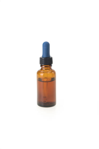 istock Dropper on white background, Oil from a pipette, essential oil bottle, aromatherapy 1264131178