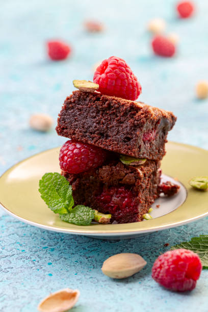 istock Traditional brownies with raspberries. 1264131642