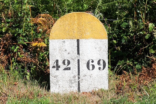 225km marker on the banks of the Rhine River at Breisach, Germany