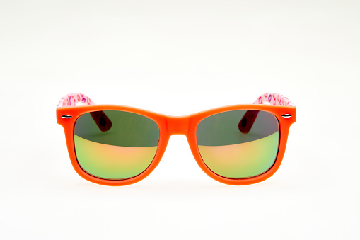 Orange sunglasses isolated on white background