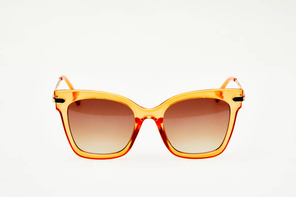 istock Transparent orange sunglasses isolated on white background 1264135948
