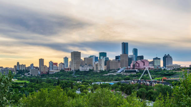 istock Edmonton Skyline with golden/ blue overcast sky and beautiful River Valley on foreground, Edmonton, Alberta, Canada 1264136608
