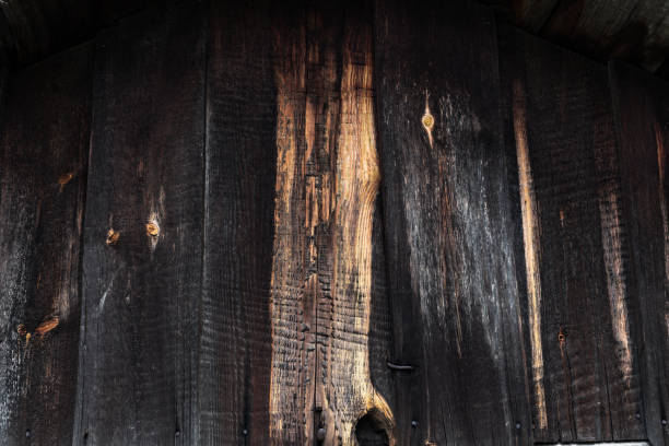 istock Dark wooden grunge background from planks. 1264136652