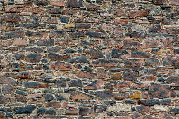 istock colorful sandstone massive stone wall background 1264137910