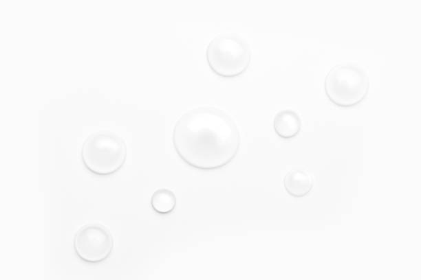 istock drops of water on a white background, top view. minimalism. purity 1264139086