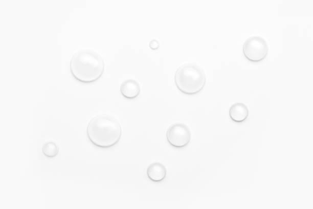 istock drops of water on a white background, top view. minimalism. purity 1264139269