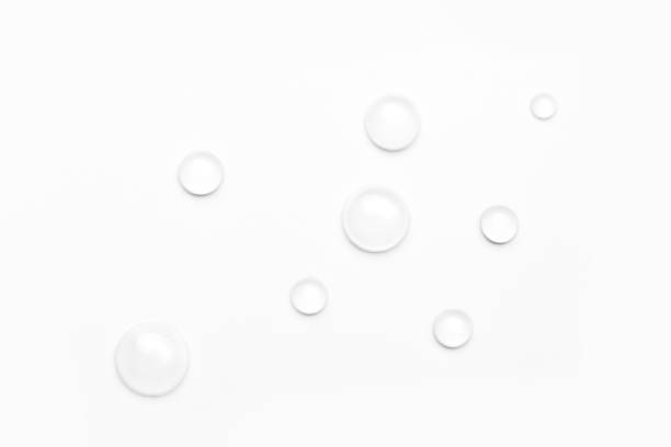 istock drops of water on a white background, top view. minimalism. purity 1264139332