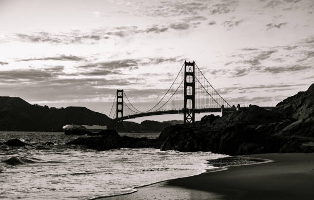 istock Golden Gate Bridge black and white Sunset on Baker's Beach 1264140944