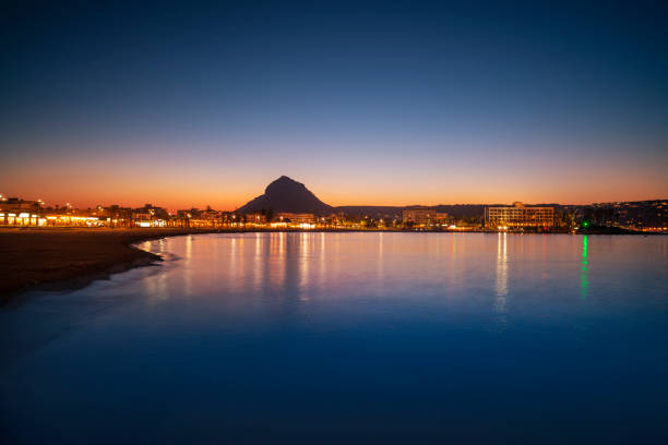 javea el arenal strand sonnenuntergang in xabia alicante - javea stock-fotos und bilder