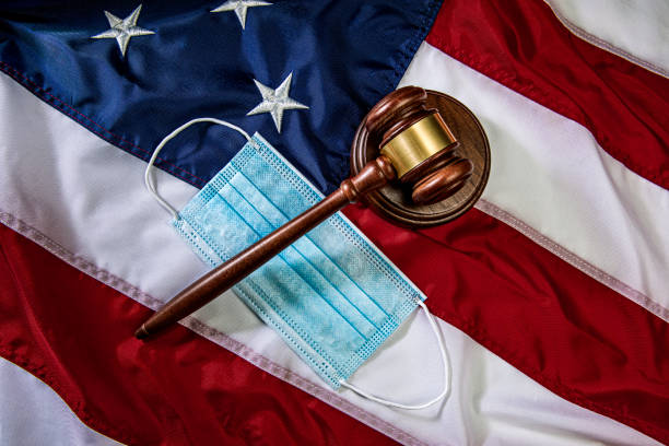 istock Mask and Gavel on American Flag Background 1264142503