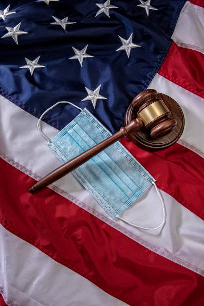 istock Mask and Gavel on American Flag Background 1264142517