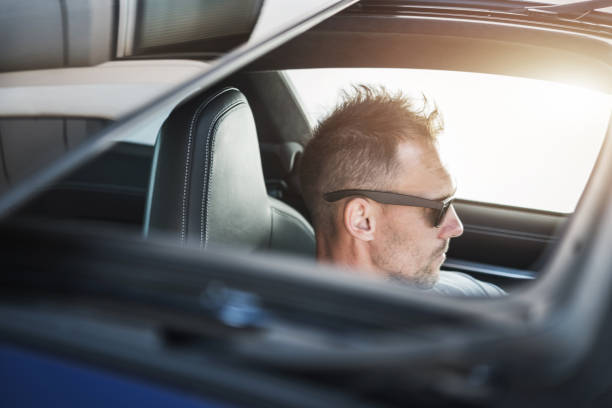 istock Summer Driving with Sunroof Opened 1264145752