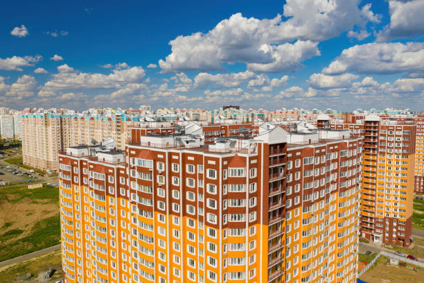 istock New district. City in summer and sky with clouds. 1264146115