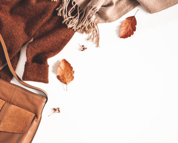 istock Autumn composition. Sweater, plaid, autumn leaves on white background. Flat lay, top view 1264146803