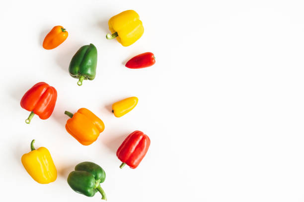 istock Peppers on white background. Flat lay, top view 1264146938