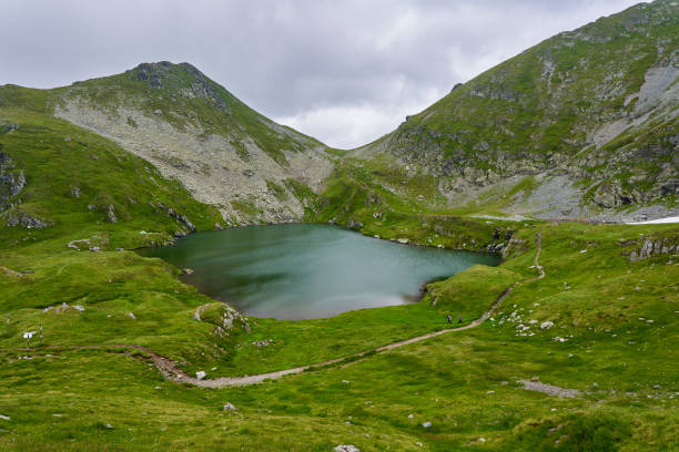 istock Glacial lake in the mountains 1264147643