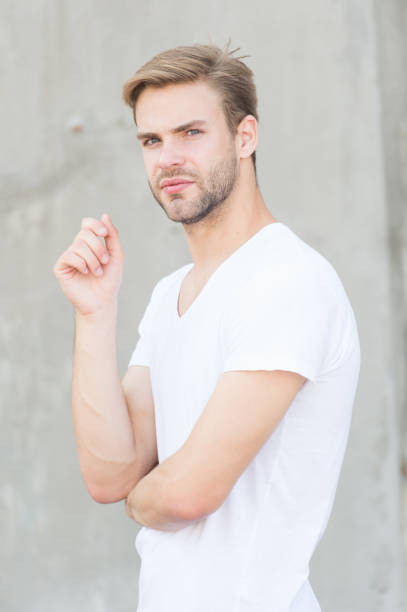 istock Pensive mood. Ideal traits that make man physically attractive. Bearded guy casual style close up. Male beauty standards. Handsome man stylish hairstyle. Handsome caucasian man gray background 1264148840