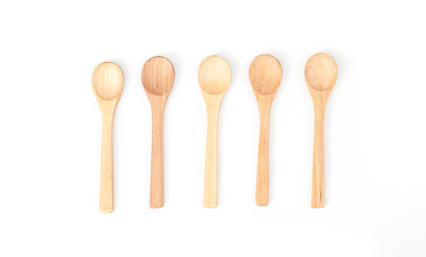 istock Small wooden measuring spoon isolated 1264151087