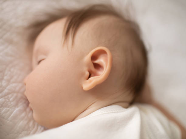 istock Sleeping newborn baby girl 1264155379