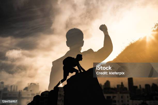 Young Man In The City Reaching His Goals Stock Photo - Download Image Now - Success, Motivation, Aspirations