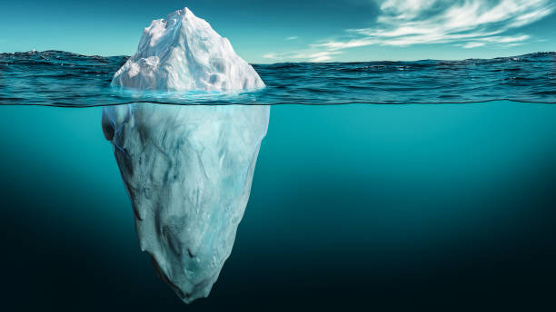 iceberg with its visible and underwater or submerged parts floating in the ocean. 3d rendering illustration. - cold frozen sea landscape imagens e fotografias de stock