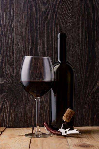 istock Wine bottle and a glass of wine. 1264164946