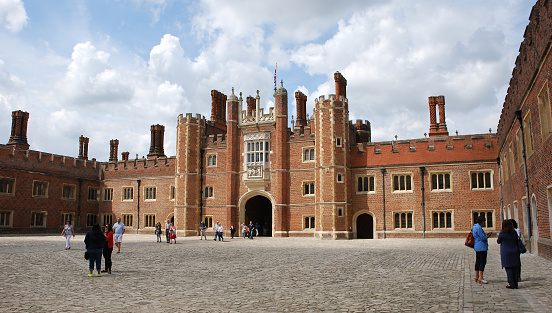 Hampton Court / London, UK - 30 June 2014: The Royal Castle of Hampton Court. Landmark in London. England