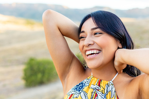 In Western Colorado Generation Z Female of Hispanic Ethnicity Posing in Desert for Fashion Series with 4K Video series also available (Shot with Canon 5DS 50.6mp photos professionally retouched - Lightroom / Photoshop - original size 5792 x 8688 downsampled as needed for clarity and select focus used for dramatic effect)