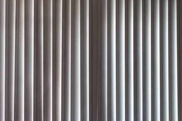 vertical window blinds. real blind curtains. - sunblinds imagens e fotografias de stock