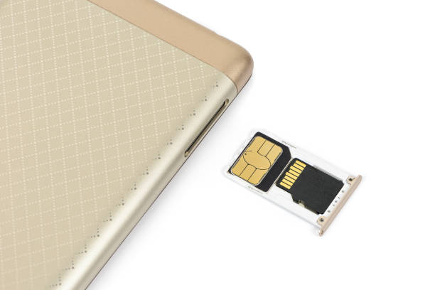 istock Sim and memory cards on a tray in front of the smartphone 1264166652