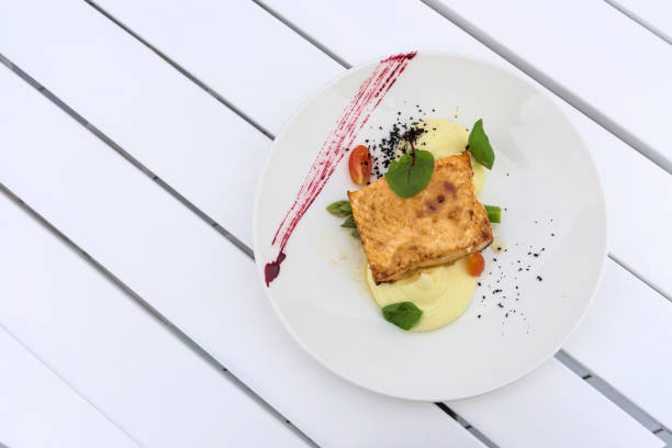 istock Salmon dish with asparagus and potato puree 1264166763
