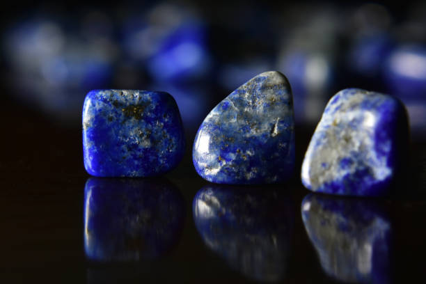 Lapis Is a beautiful natural gemstone on a wooden floor