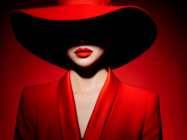 istock Beautiful girl with make-up wearing red jacket and hat 1264168458