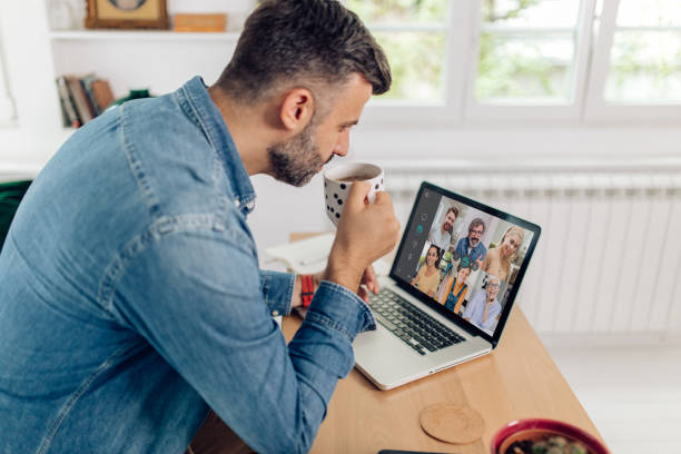 istock Man and his colleagues having a video meeting 1264170596