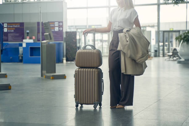 istock Young blonde female waiting for her flight 1264170727