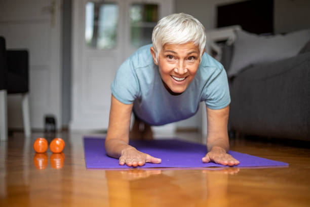 istock Senior mature woman doing yoga. 1264171782