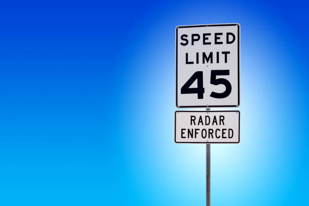 Speed Limit 45 Radar Enforced street sign with blue background