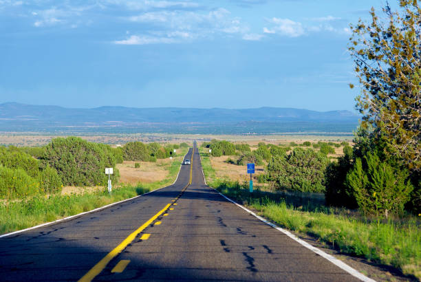 A section of West Old Highway 66, also known as “Historic Route 66”, between the towns of Seligman, Arizona, and Ash Fork, Arizona in late afternoon.