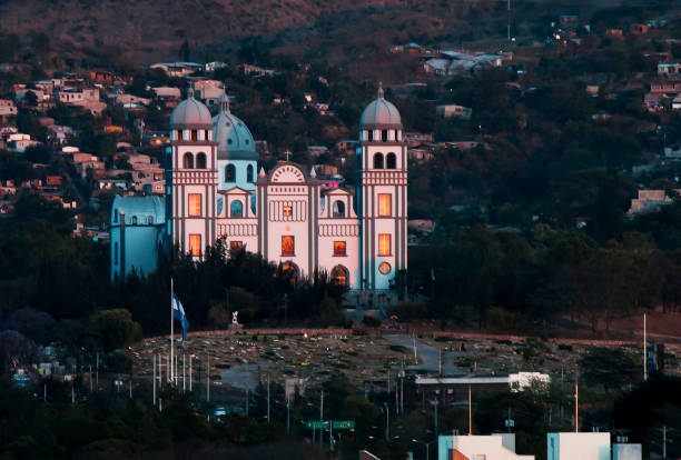 A nice sunset light over the facade of cathedral in Honduras Red sunset light over the Cathedral of Suyapa in Tegucigalpa, Honduras honduras stock pictures, royalty-free photos & images